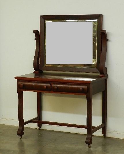 Empire Style Dressing Table: with two drawers and mirror, legs have multiple spots of veneer damage, wear and scratches throughout. 54" h x 40" w x 21" d