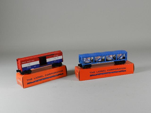 2 Lionel Cars W/boxes: 6475 Libby vat car and 6428 US mail car. Both excellent. Boxes are very good.