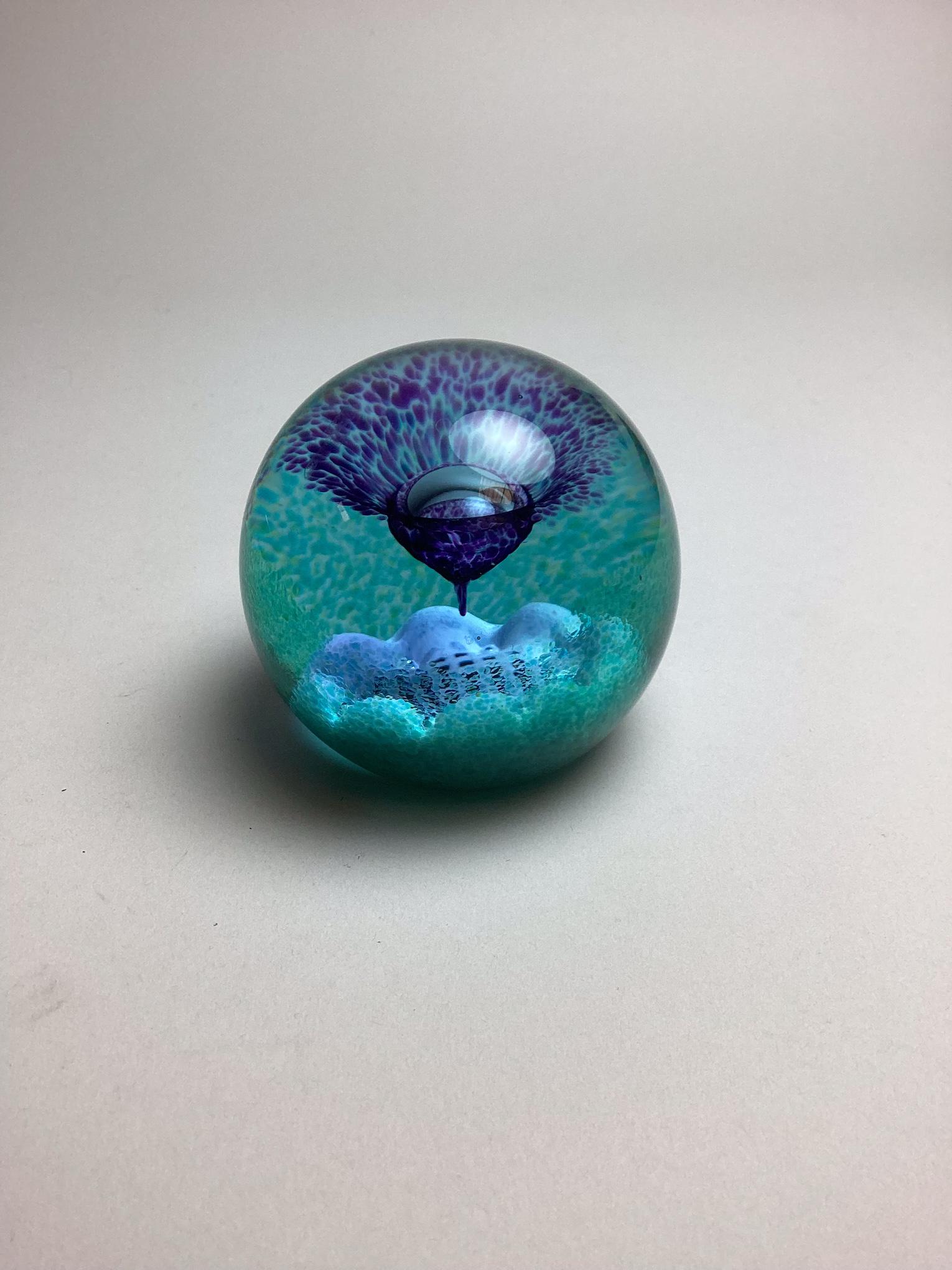 Caithness Scotland Flower of Scotland Paperweight: Has etched mark on bottom. Minor wear. 3" diameter.