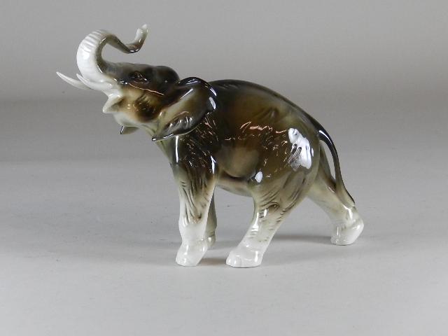 Royal Dux Porcelain Elephant: Minor wear. 10" l x 8" t
