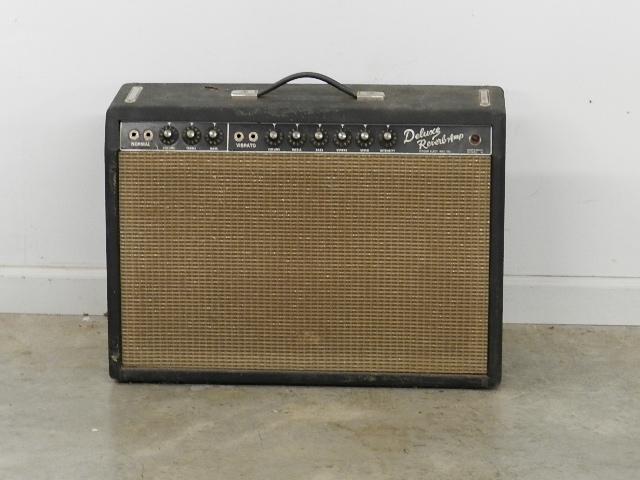 Vintage Fender Deluxe Reveb-amp: Spots of damage to case cover. Power cord is damaged. All tubes appear to be included. Untested. 24"w x 8 1/2" d x 17"