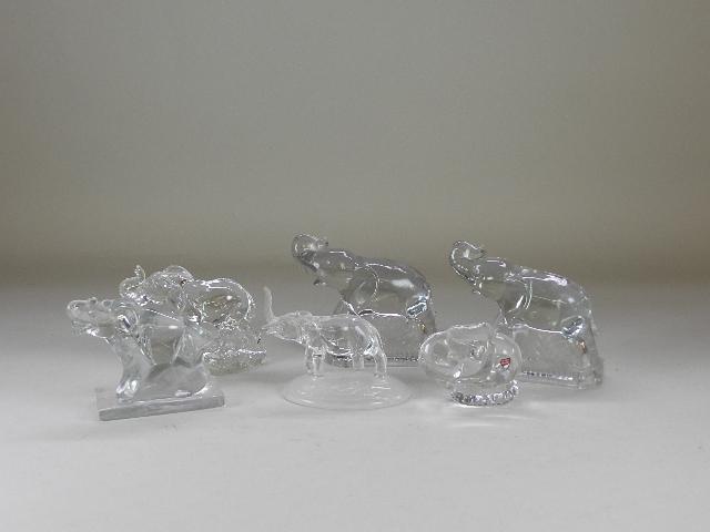 Group of Crystal and Glass Elephants: Includes an Orrefors. Minor wear . Largest 6" tall