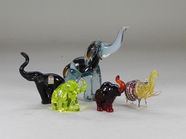 5 Art Glass Elephants: One is Fenton and one is Pilgrim Glass. Minor wear. Largest 7 1/2" tall
