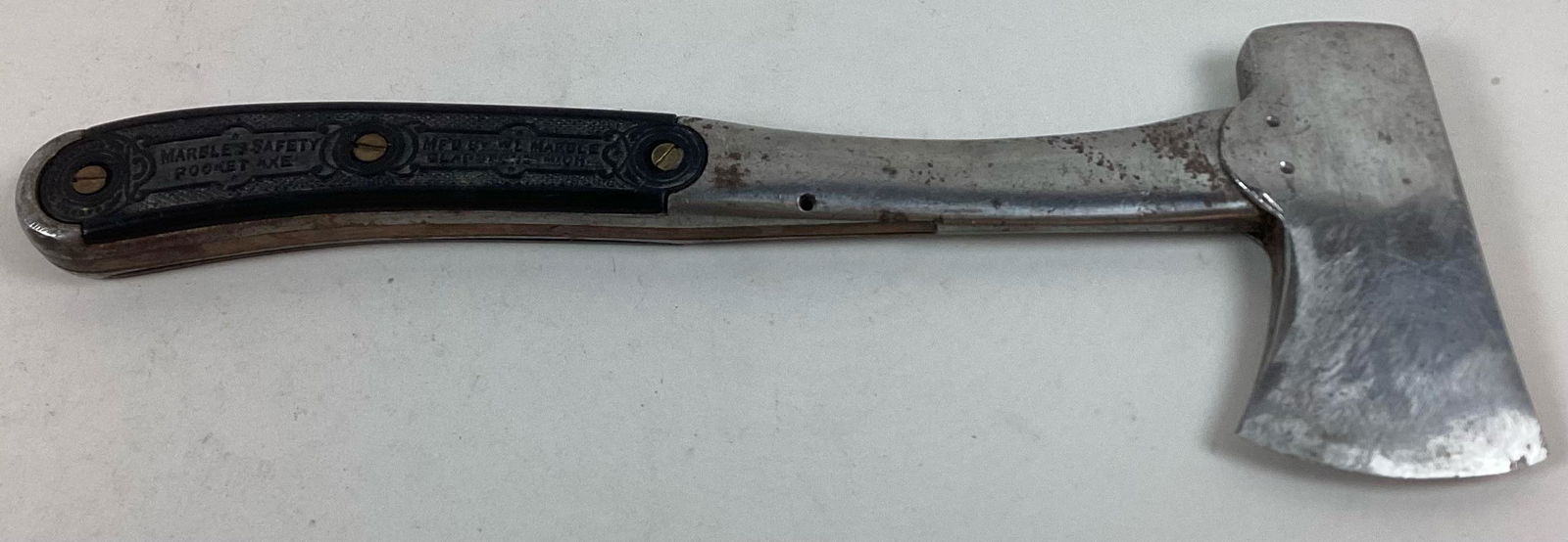 Marbles Safety Pocket Axe: Missing folding safety cover. Area in handle for sheath filled with wood. Wear from use and rust. 11 1/4? long.