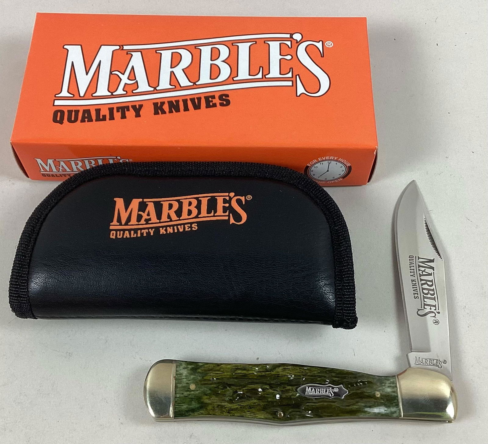 Marbles MR194 Pocket Knife: Has green bone handles. Comes with original box and case. Minor wear. 5 1/2? closed.