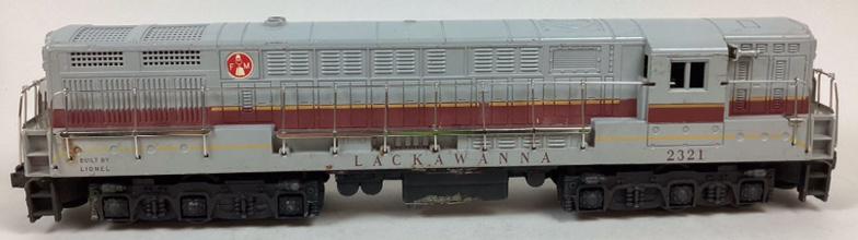 Lionel 2321 Lackawanna FM Trainmaster Engine: Battery box has some corrosion. Areas of wear and has one screw crack. Untested. 16? long