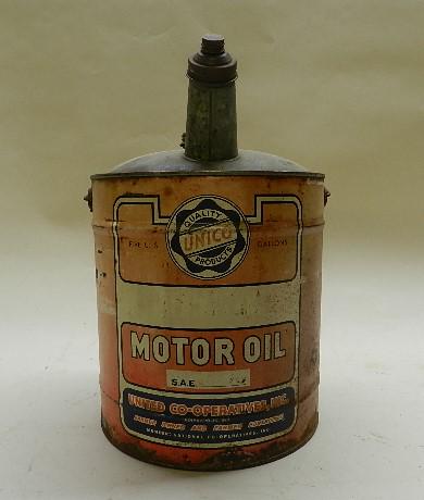 Unico 5 Gallon Oil Can: fading and some rust, 17" h x 11" "d