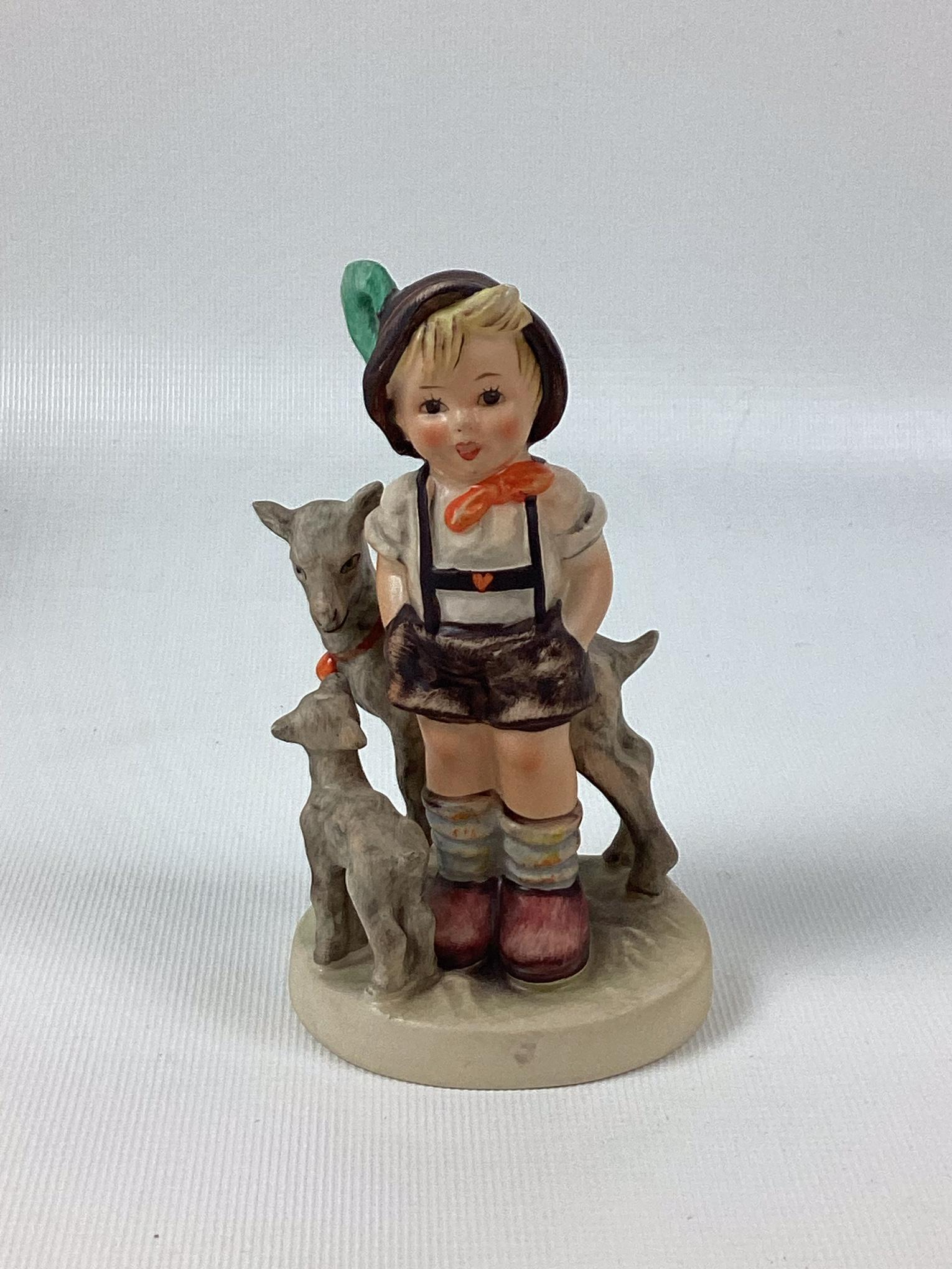 Goebel Hummel Little Goat Herder: Trademark 4. Minor wear. 4 1/2" tall.