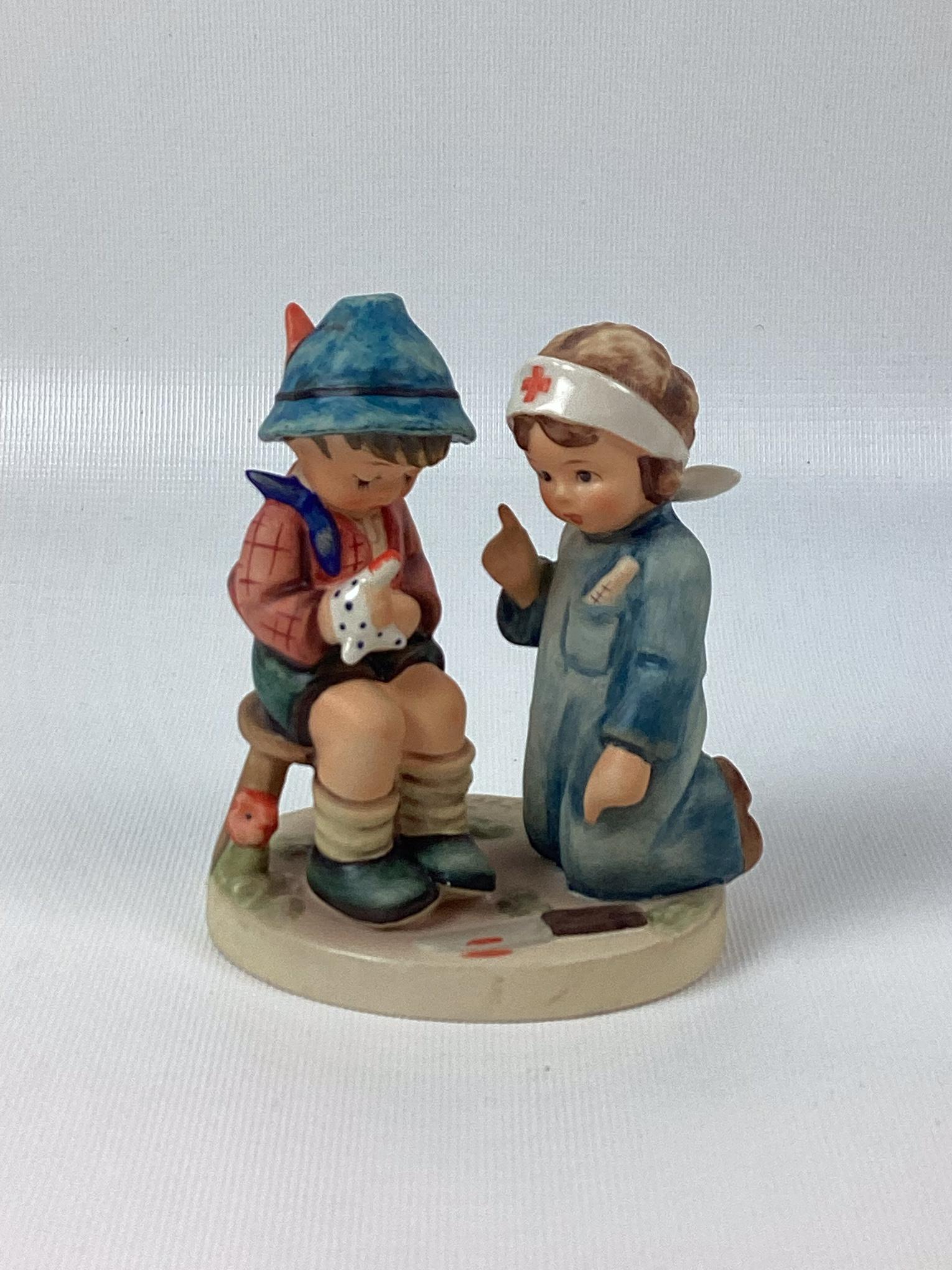 Goebel Hummel Little Nurse: Trademark 6. Minor wear. 4 1/4" tall.