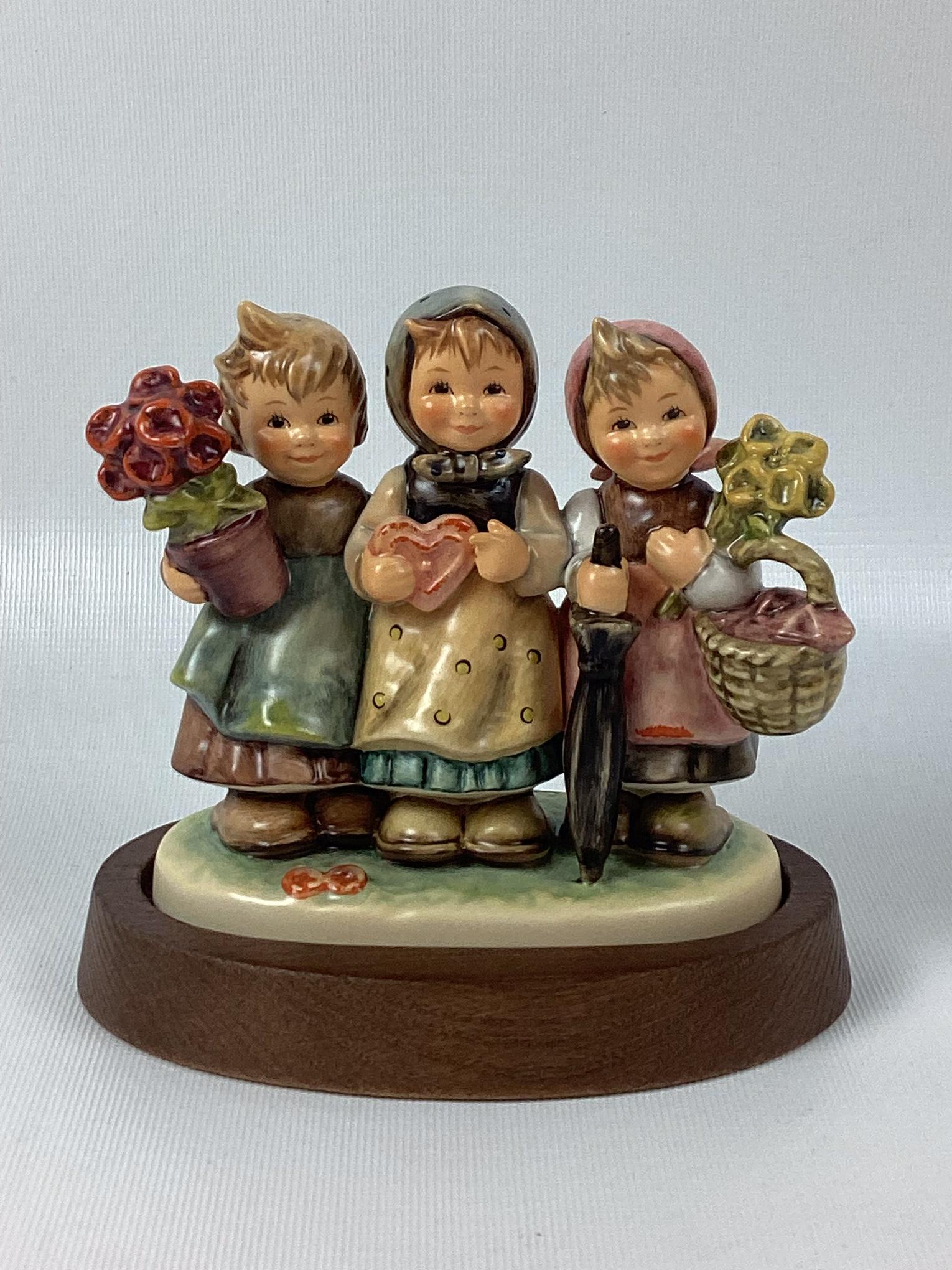 Goebel Hummel Trio of Wishes: Trademark 7. Minor wear. 4 1/2" tall.