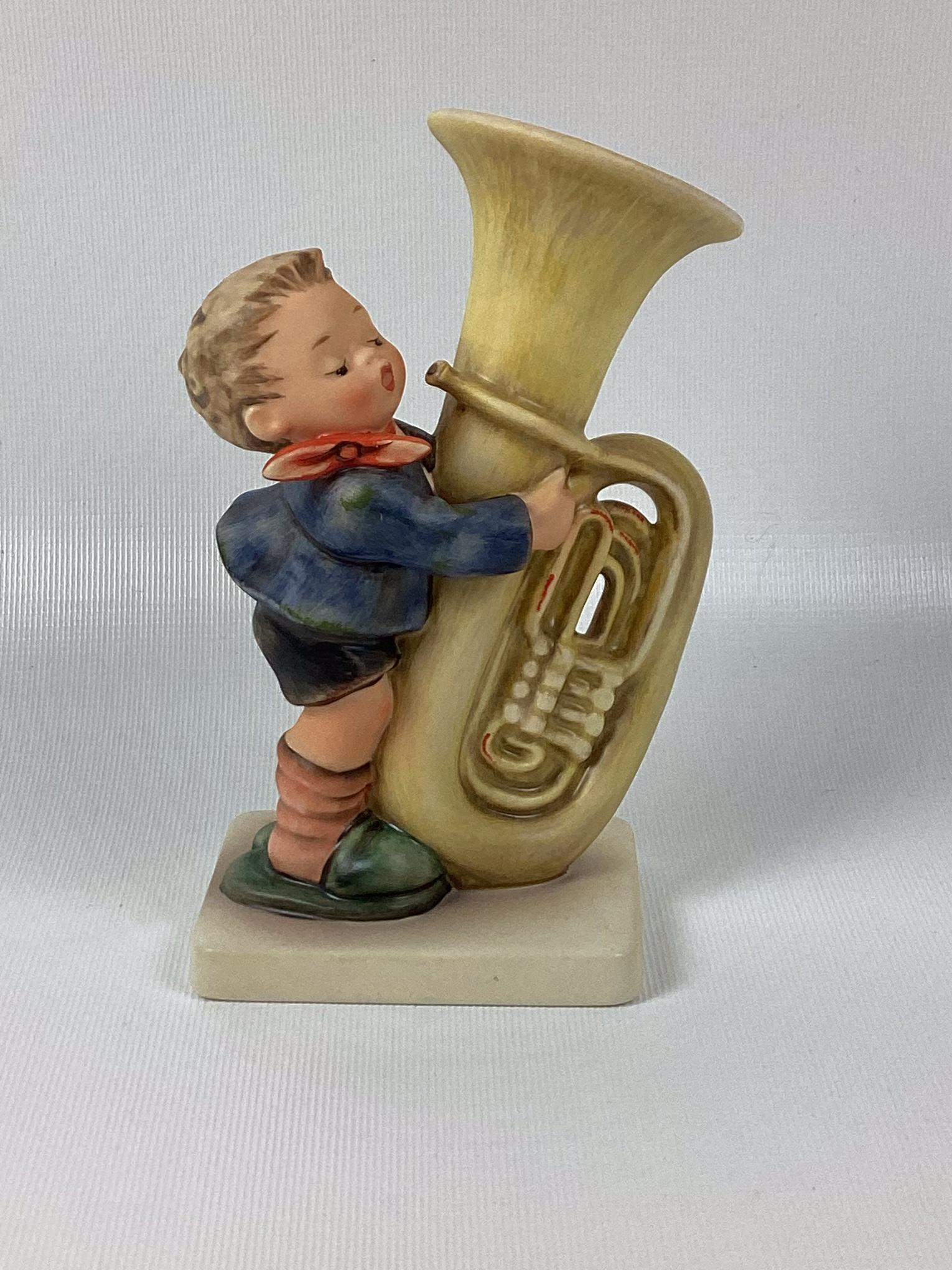 Goebel Hummel The Tuba Player: Trademark 6. Minor wear. 6" tall.