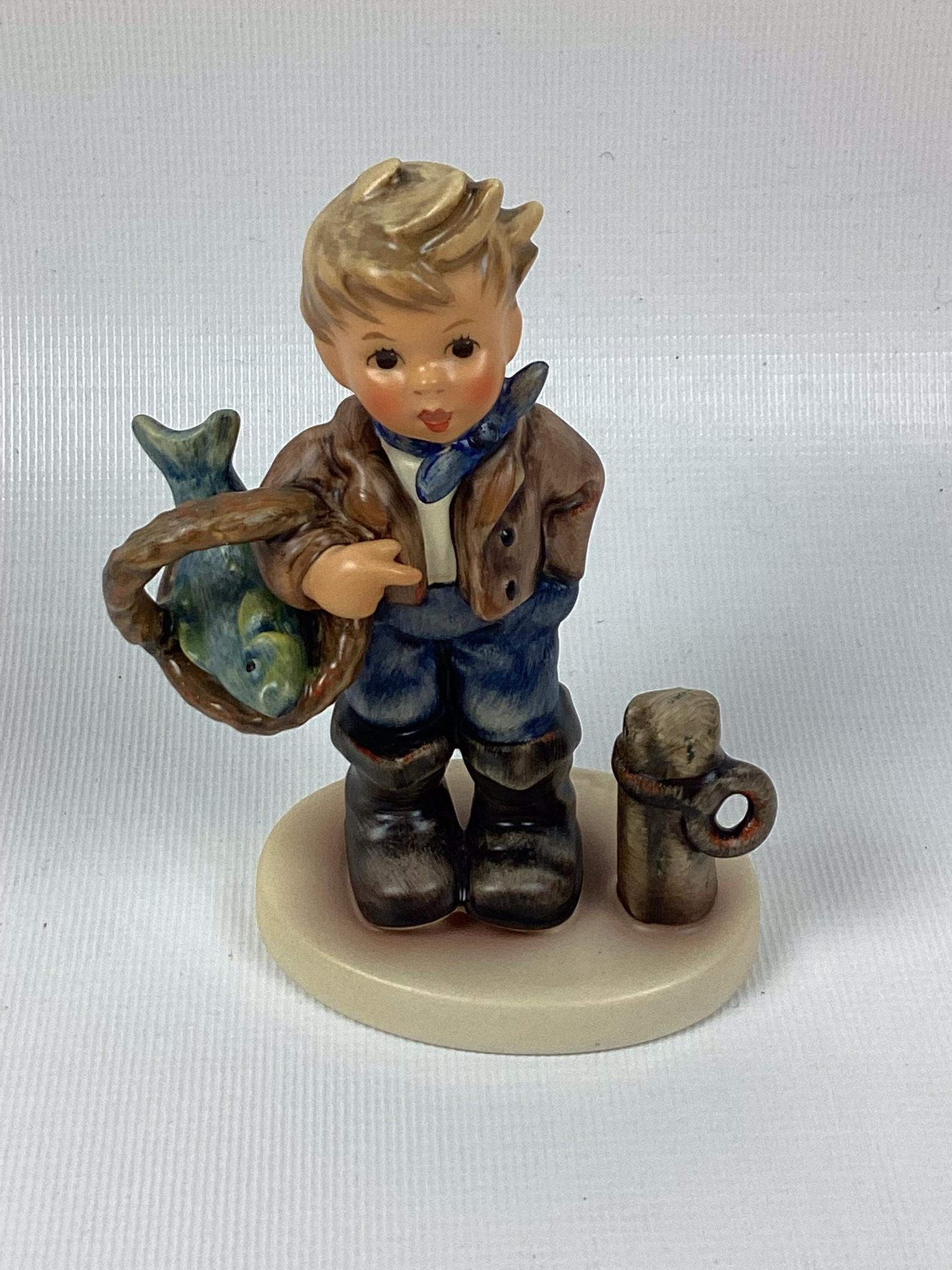 Goebel Hummel Catch of the Day: Trademark 8. Excellent condition. 4 1/4" tall.