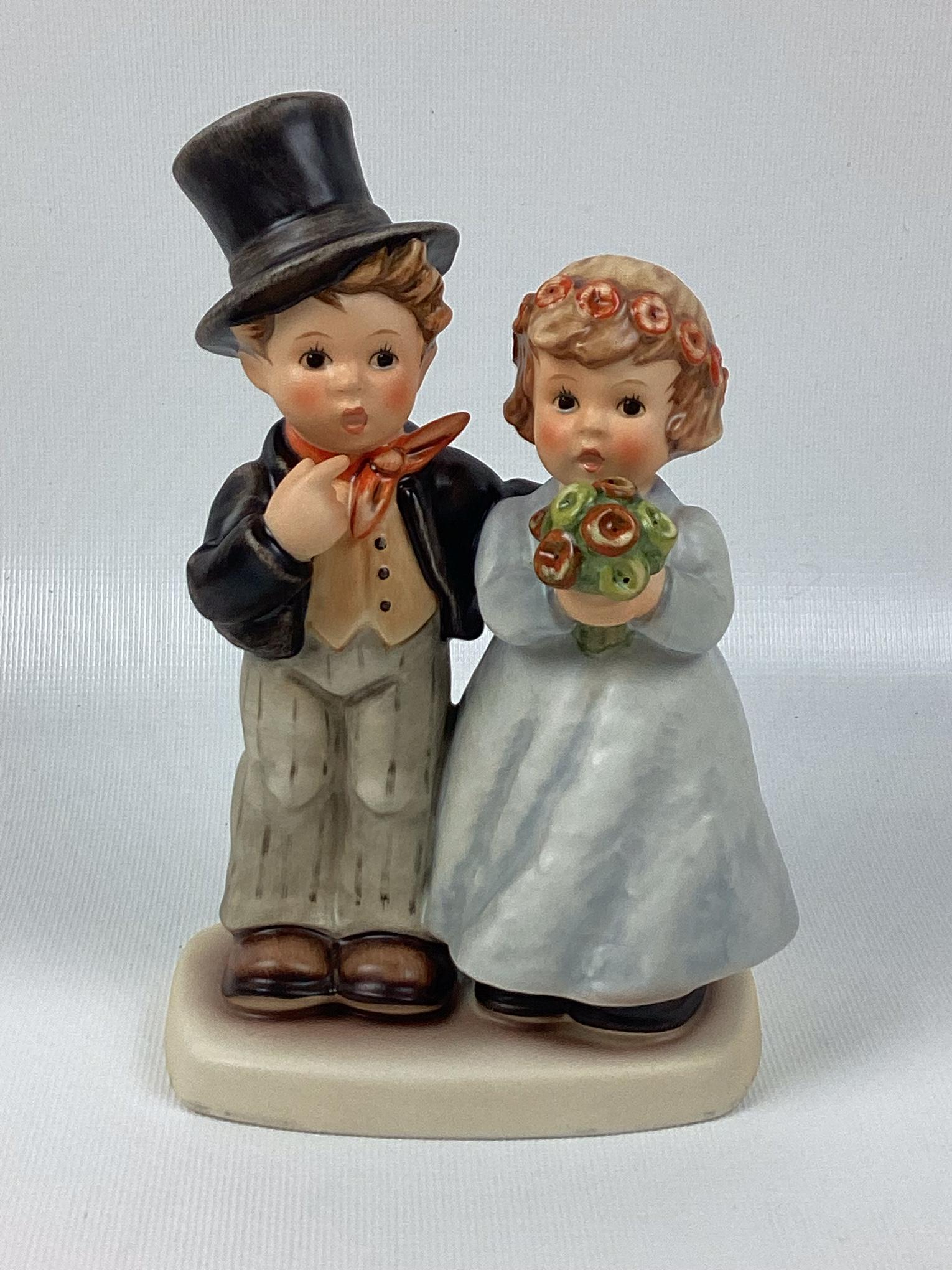 Goebel Hummel Dearly Beloved: Trademark 7. Minor wear. 6 1/2" tall.