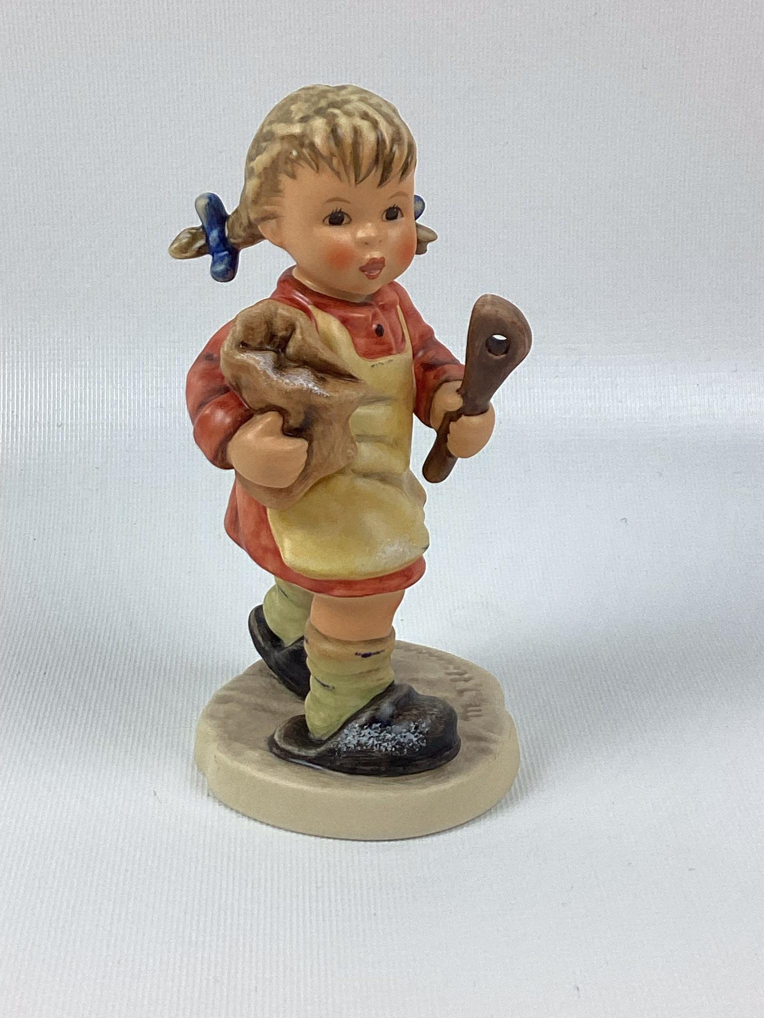 Goebel Hummel Mixing the Cake: Trademark 8. Excellent condition. 5 3/4" tall.