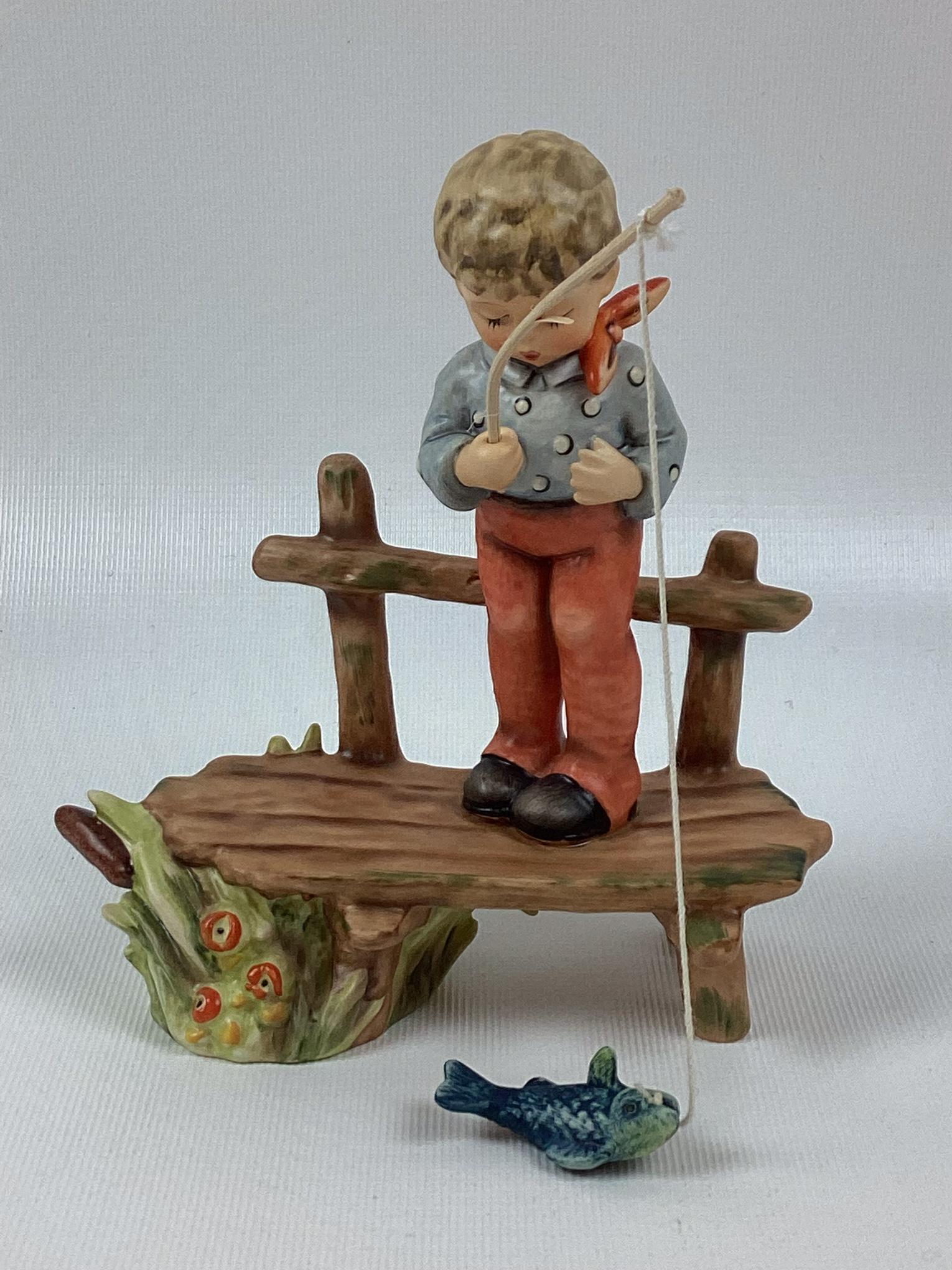 Goebel Hummel The Angler: Trademark 7. Excellent condition. 6" tall.