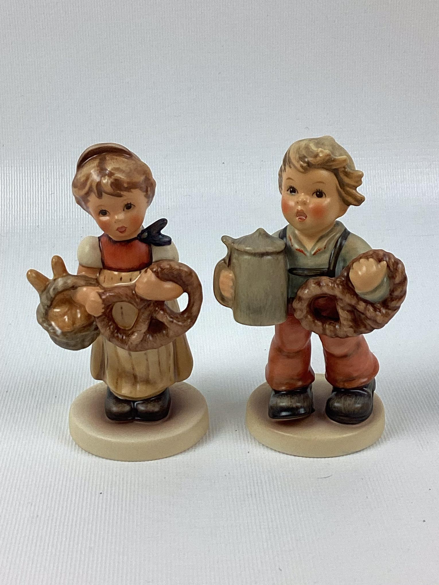 2 Goebel Hummels Pretzel Girl and Pretzel Boy: Trademark 7 and 8. Excellent condition. 4 1/4" tall.
