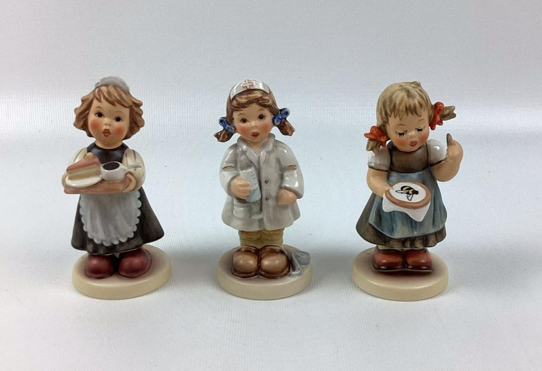 3 Goebel Hummels: Maid to Order, Comfort and Care, Bee Hopeful. Bee Hopeful is numbered 7178 of 25000. Trademark 8. Excellent condition. 4 1/4" tall.