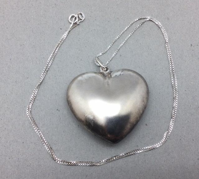 Sterling Puffy Heart Necklace: On 24 inch chain. Heart is 1.75 inches wide. Good condition.