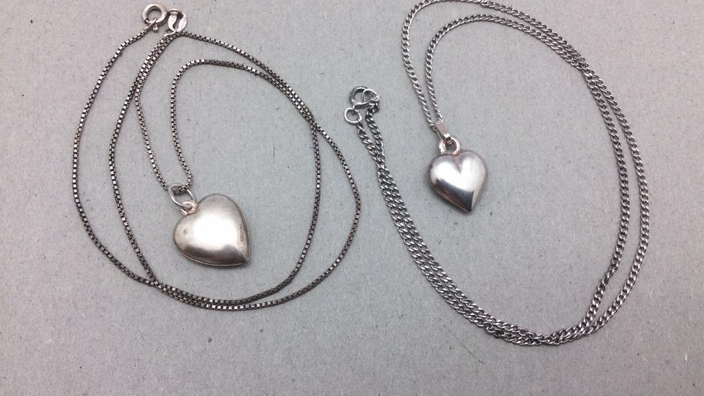 Two Sterling Puffy Heart Necklaces: On 18 inch chains. Good condition.