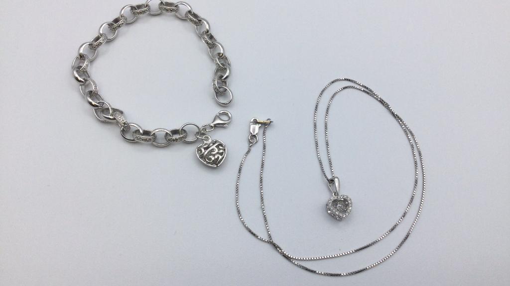 Sterling Heart Jewelry: CZ Illusion heart on 20 inch box chain. 7.5 inch bracelet with heart charm. Good condition.