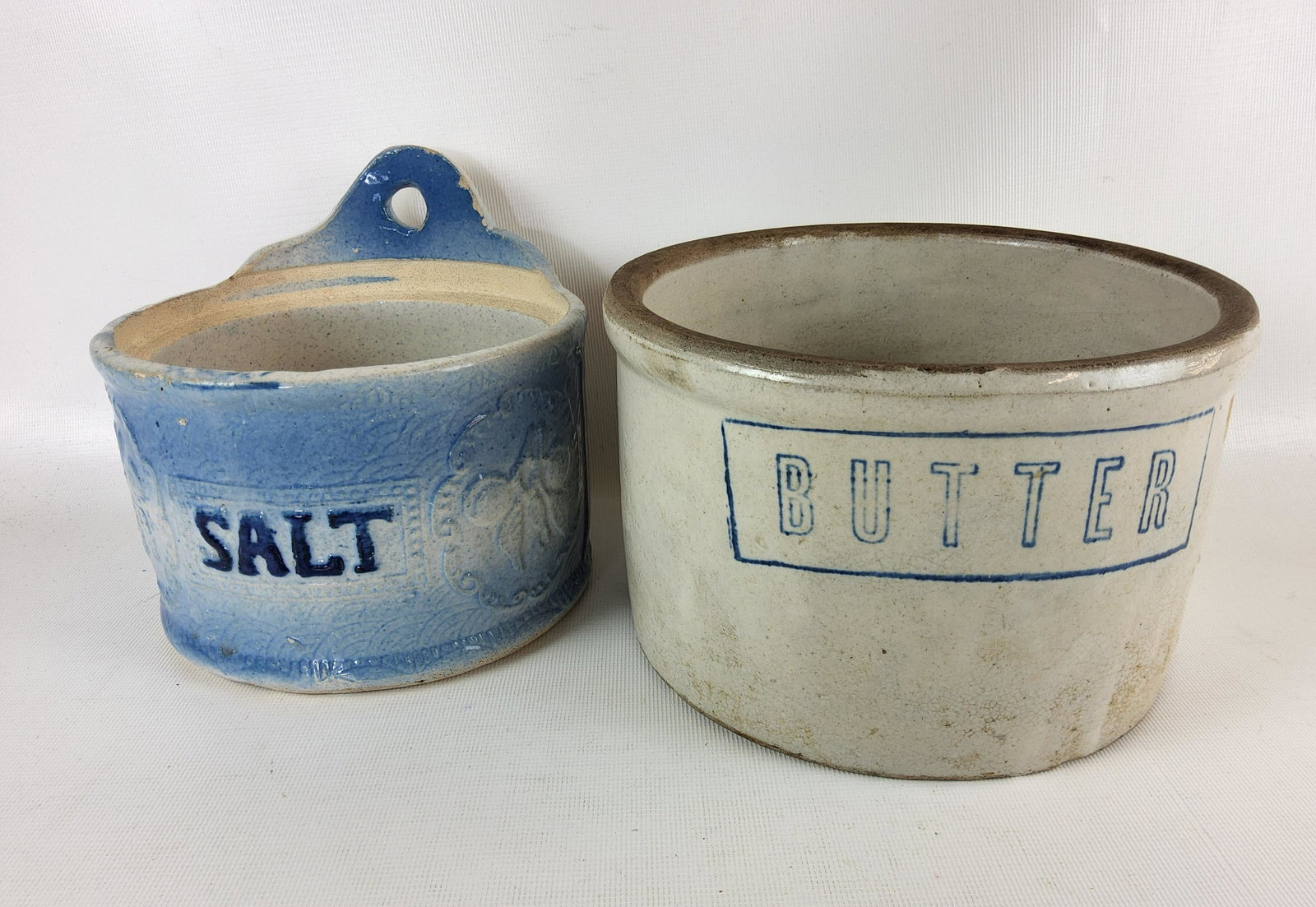 Vintage Butter Crock and Hanging Blue Glaze Salt Glaze Crock: General wear on both with rim chips on salt crock - 6" and 7.5" in diameter