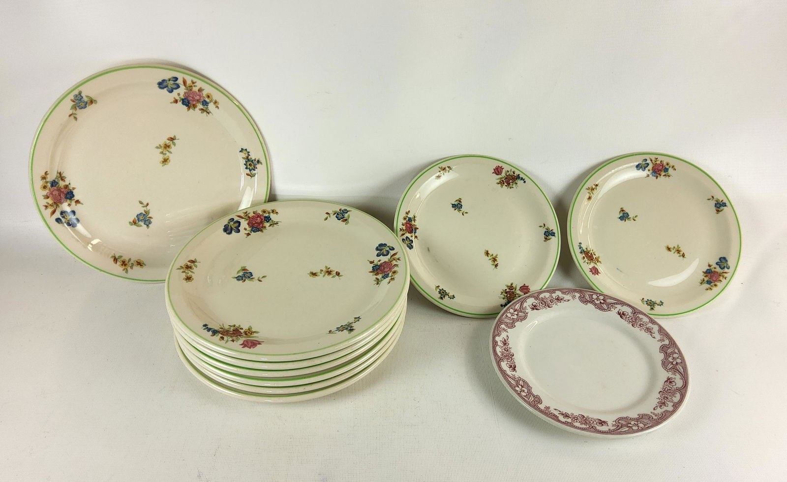 Mayer China True Ivory Dresden Pattern Plates: Good condition with general wear- seven 9" Plates, two 7.25" plates, one 7.25" Wellsville plate