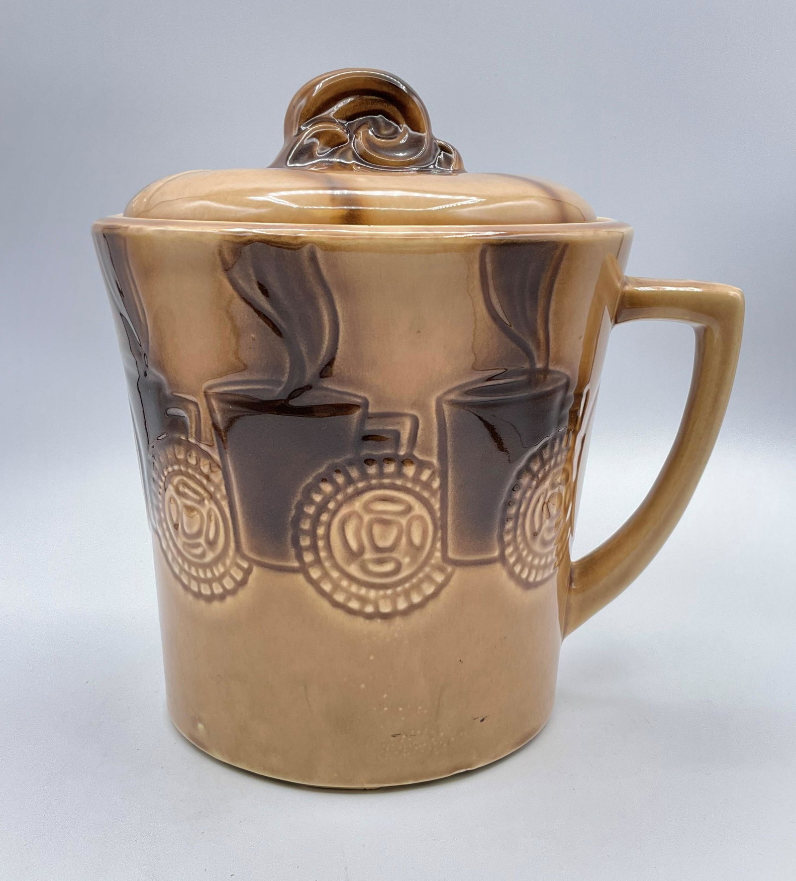 McCoy Cookie Mug Jar: Marked USA on handle. From 1965. Good condition. 9.25 inches tall.