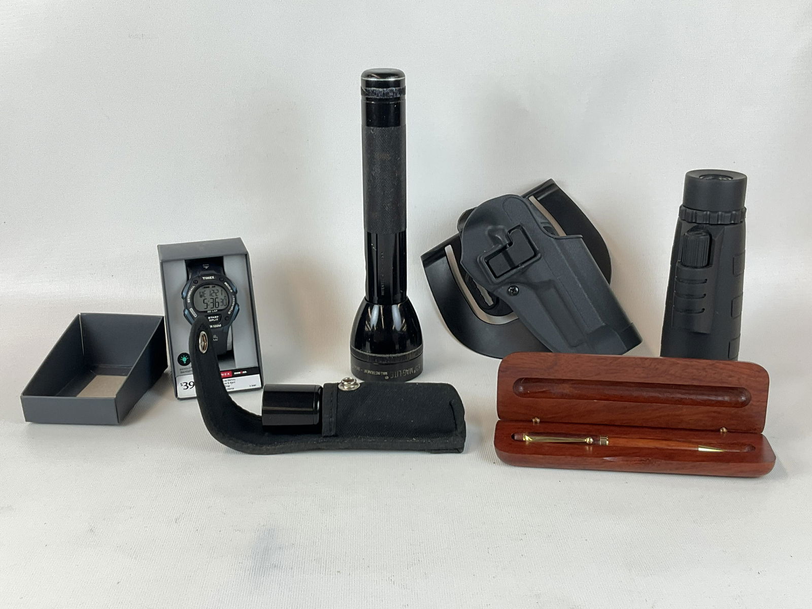 2 Flashlights, Timex WR-100m Wristwatch, Ink Pen, Spotting Scope and Blackhawk Holster: Good condition with light general wear