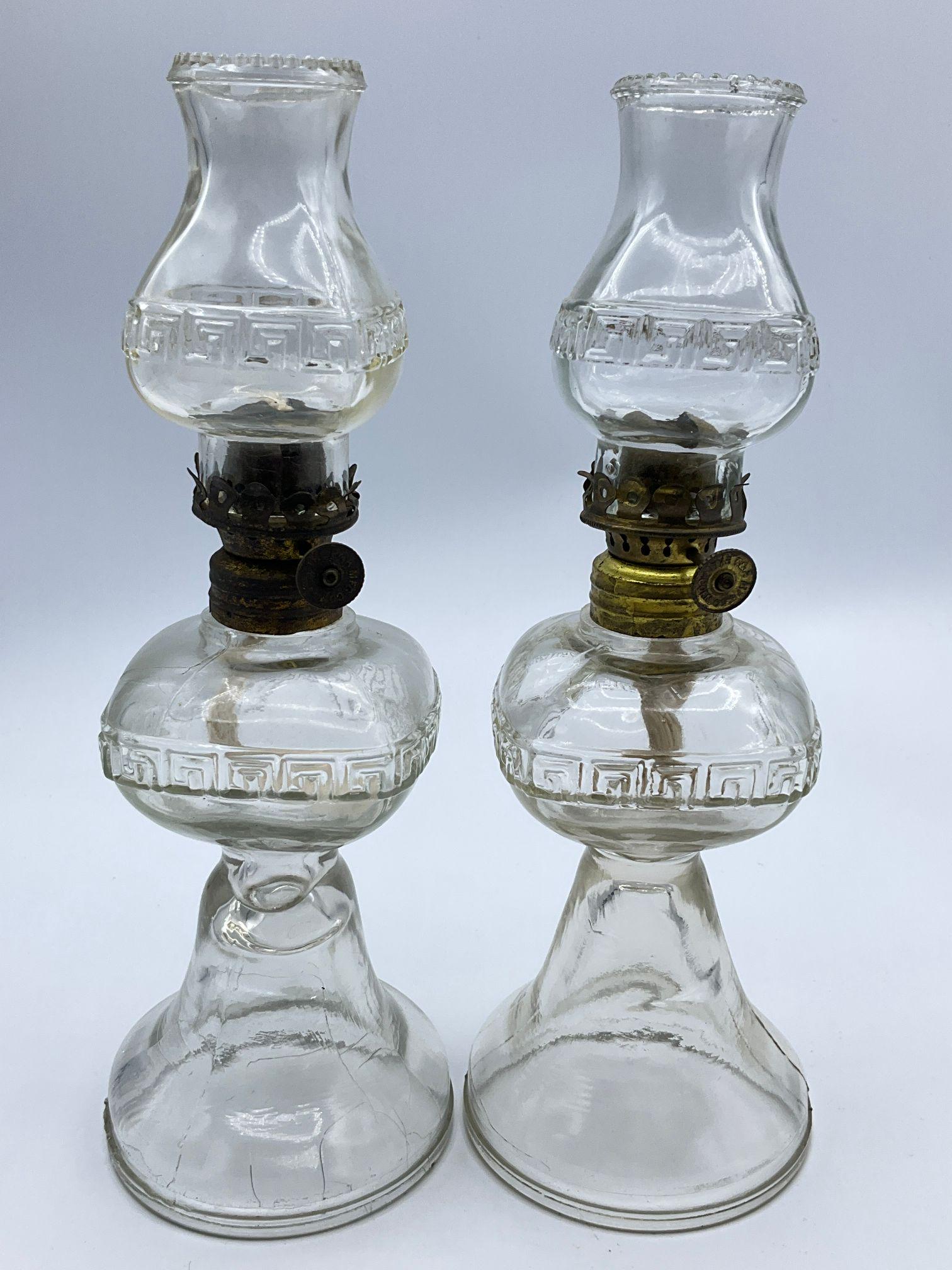 Pair of Greek Key Miniature Lamps: P & A burners. Damage to beaded edge of one globe, fisheye damage to the other. 8.5 inches tall.