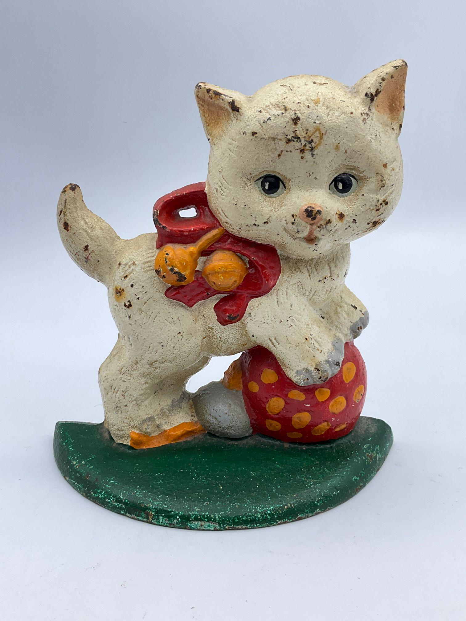 Cast Iron Cat Doorstop: Rust and paint loss. 6.5 inches wide x 7 inches tall.