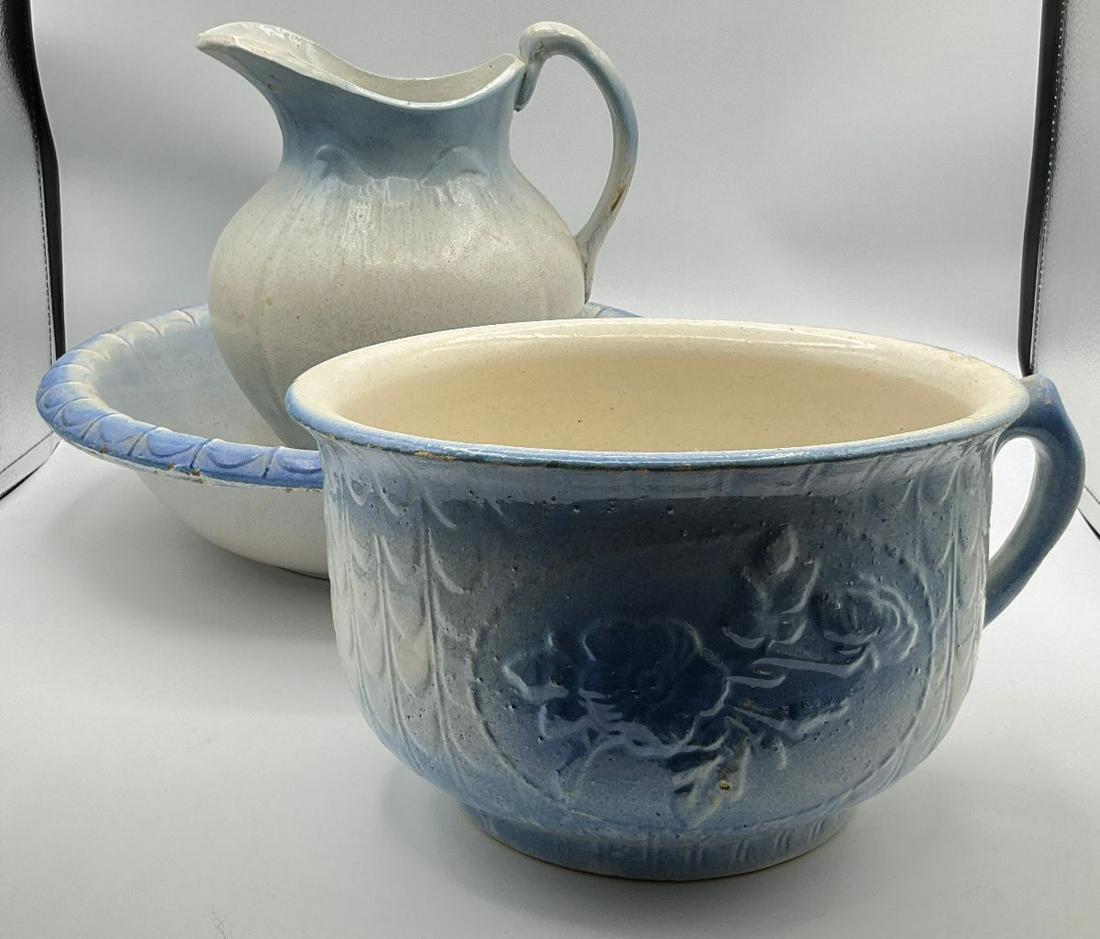 Blue & White Salt Glaze Pieces: Bowl and pitcher are not a match. Handle is cracked and glued on pitcher, 9 inches tall. Bowl is 13 inches wide. Along with a chamber pot with floral and fish scale design, chipped rim and hairline cr