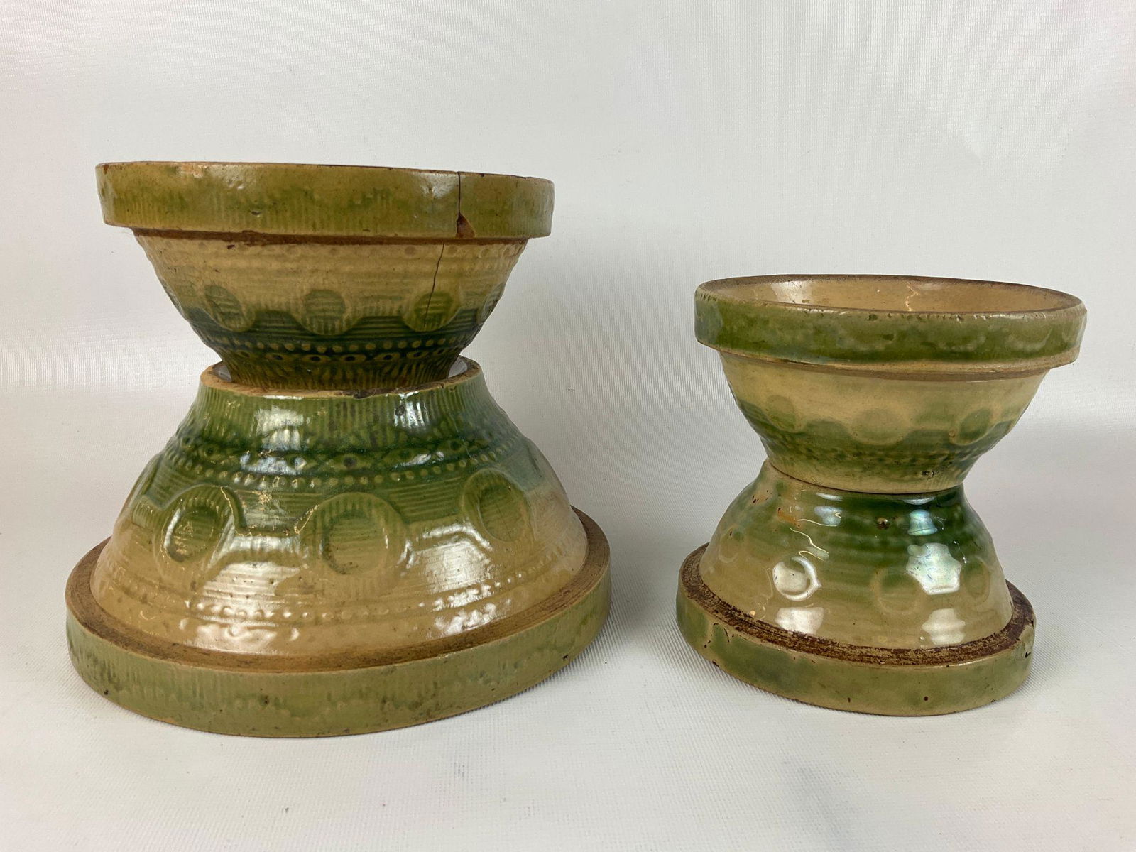Green Glaze Yellow Ware Wedding Ring Bowls: Sizes 8,6, and 5 in poor condition. All badly cracked and chipped. An additional 5 inch diameter bowl is in decent condition with crazing.