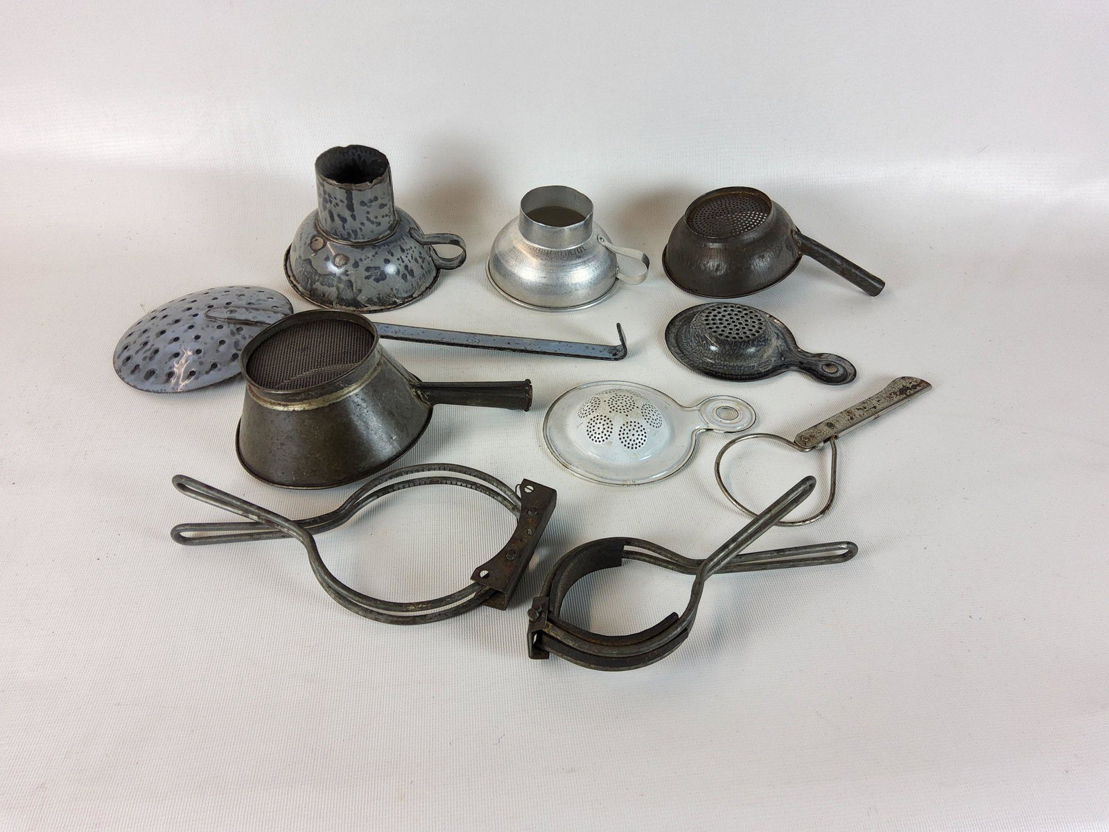 Group of Graniteware Kitchen Funnels, Strainers, etc.: General wear from use - 4" - 14"