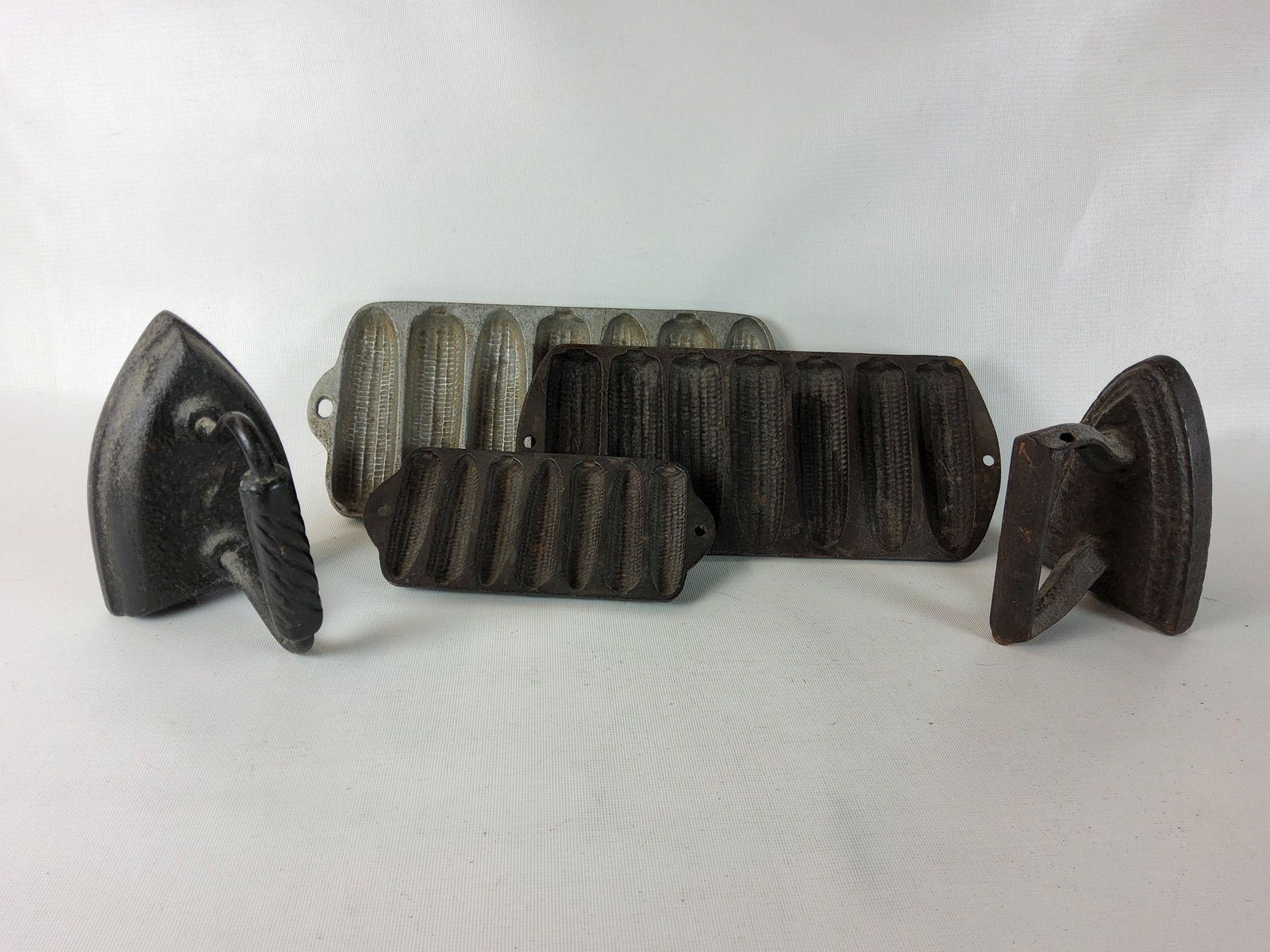 Group of Cast Iron Cornstick Pans and Sad Irons (1 of 3)