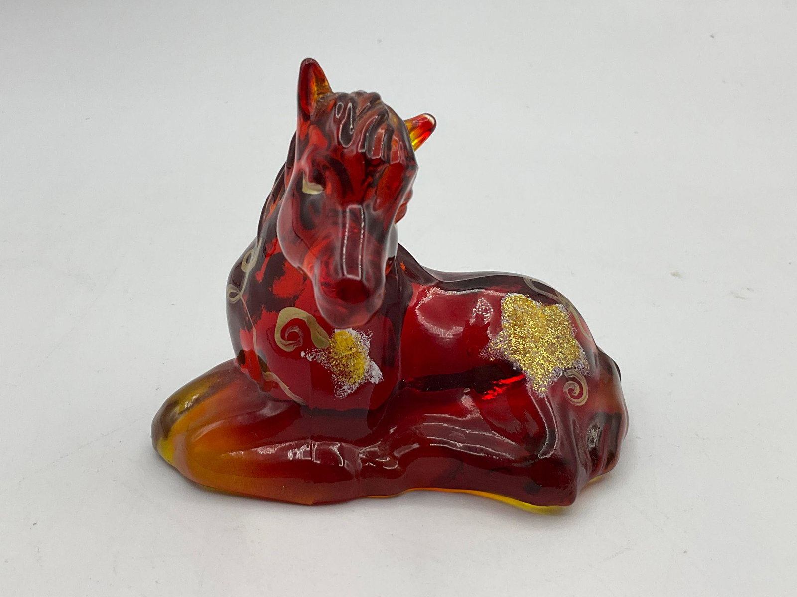 Fenton Amberina Horse Pony Figurine: Hand painted, signed. With foil sticker. Decorated with stars. Good condition. 3.5 " tall.