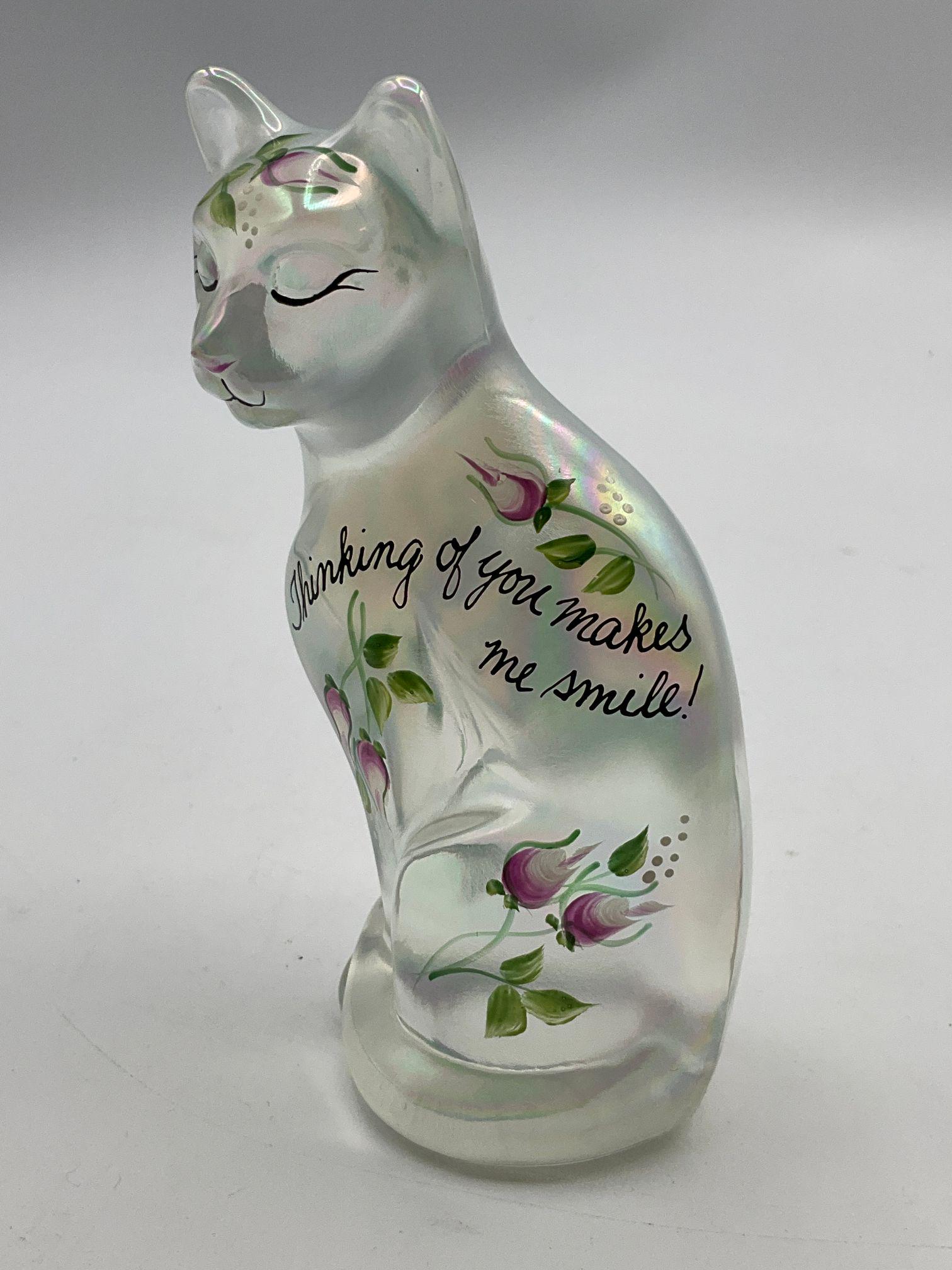 Fenton Stylized Cat Figurine: In French Opalescent. Hand painted " Thinking of you Makes Me Smile". Fenton 100th. Signed by artist and Scott Fenton. Good condition. 5 " tall.