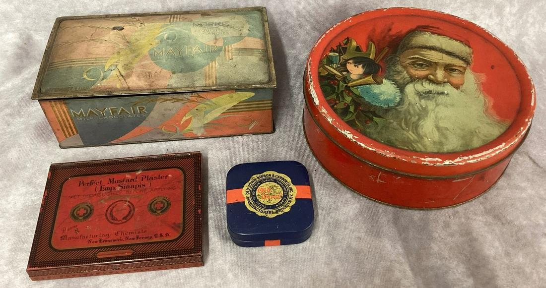 Group of Early 1900s Advertising Tins Santa: The Santa Claus tin has buttons and sewing notions inside. All show wear and some fading. Largest 7 1/2" w