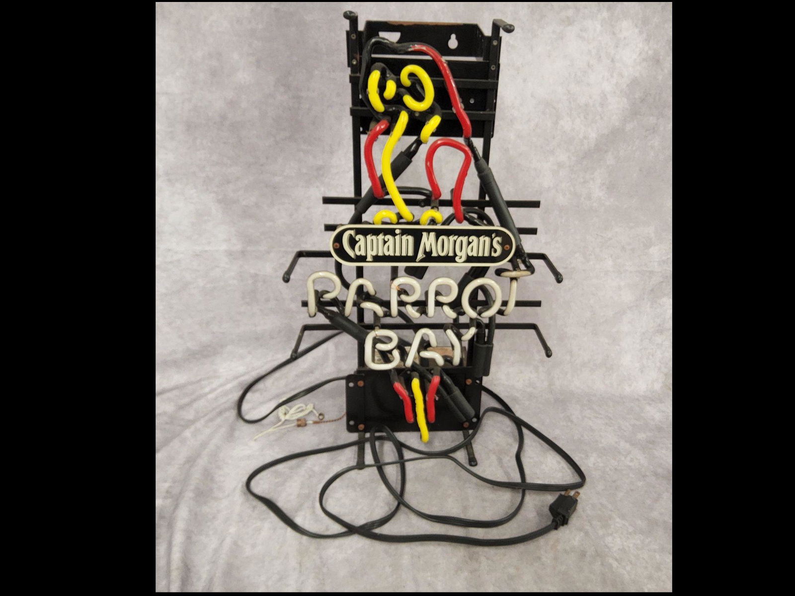 Captain Morgan's Parrot Bay Neon Sign Beer: Good, but non-working, condition. Some general surface wear and a couple of small repairs. Measures 6 inches x 8 inches x 22 inches.