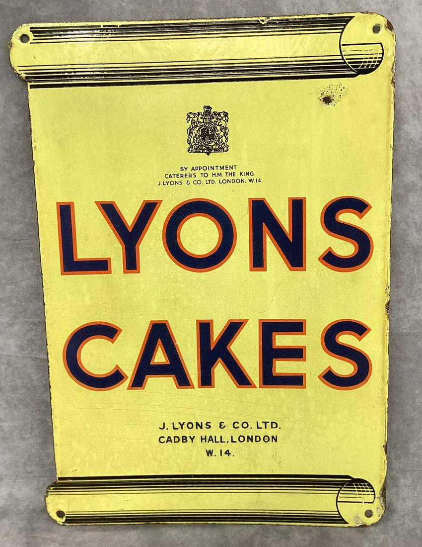 Original 1930s Double Sided Porcelain Sign Lyons Cakes London: J Lyons' Co Limited Cadby Hall London Caters to His Majesty the King. Chips along the edges and at the corners and one spot of damage I'm the upper field on one side. 15"w. 21 1/2"t