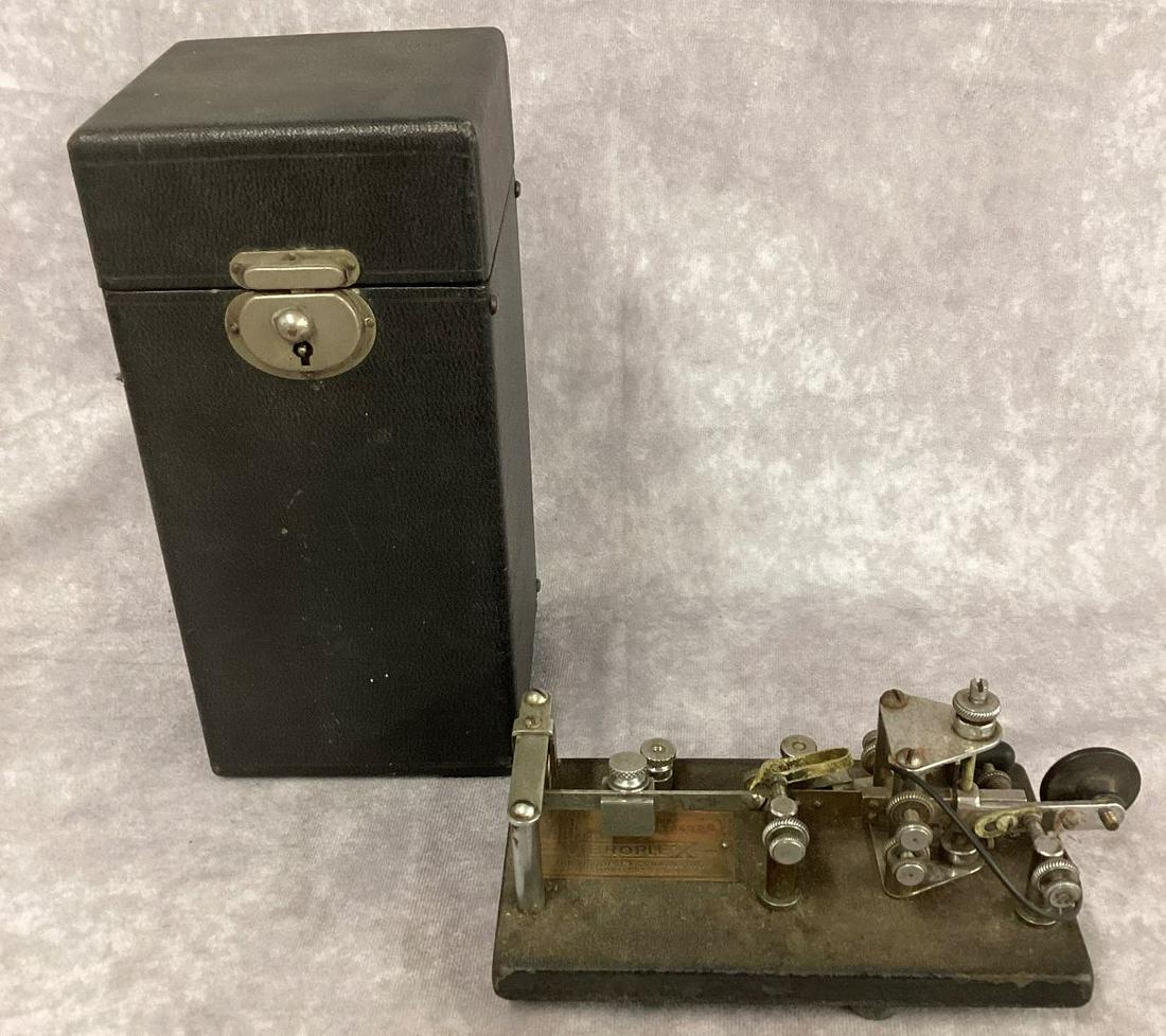 Vibroplex Telegraph Key in Fitted Carry Case: Handle is missing from case. Key shows wear and some paint loss. 6 1/2" l x 3 1/2" deep.
