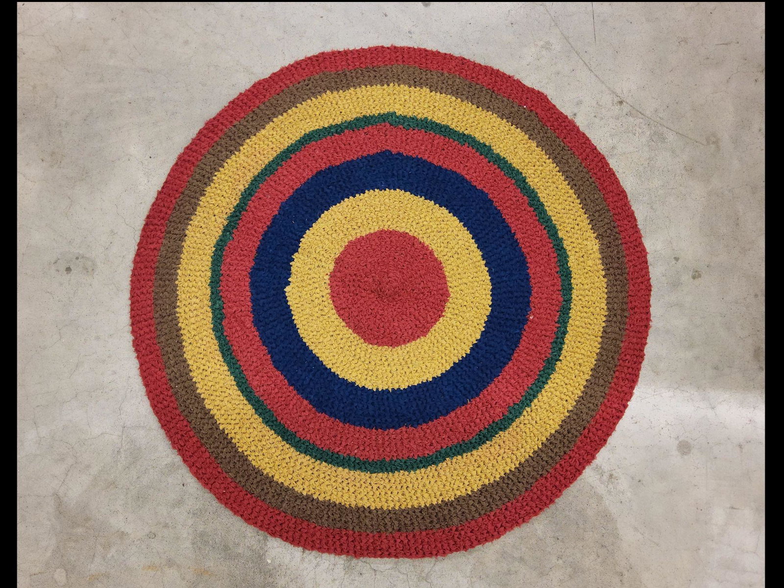 Vintage Round Bullseye Hooked Throw Rug: No separations noted. Measures 34 inches across.