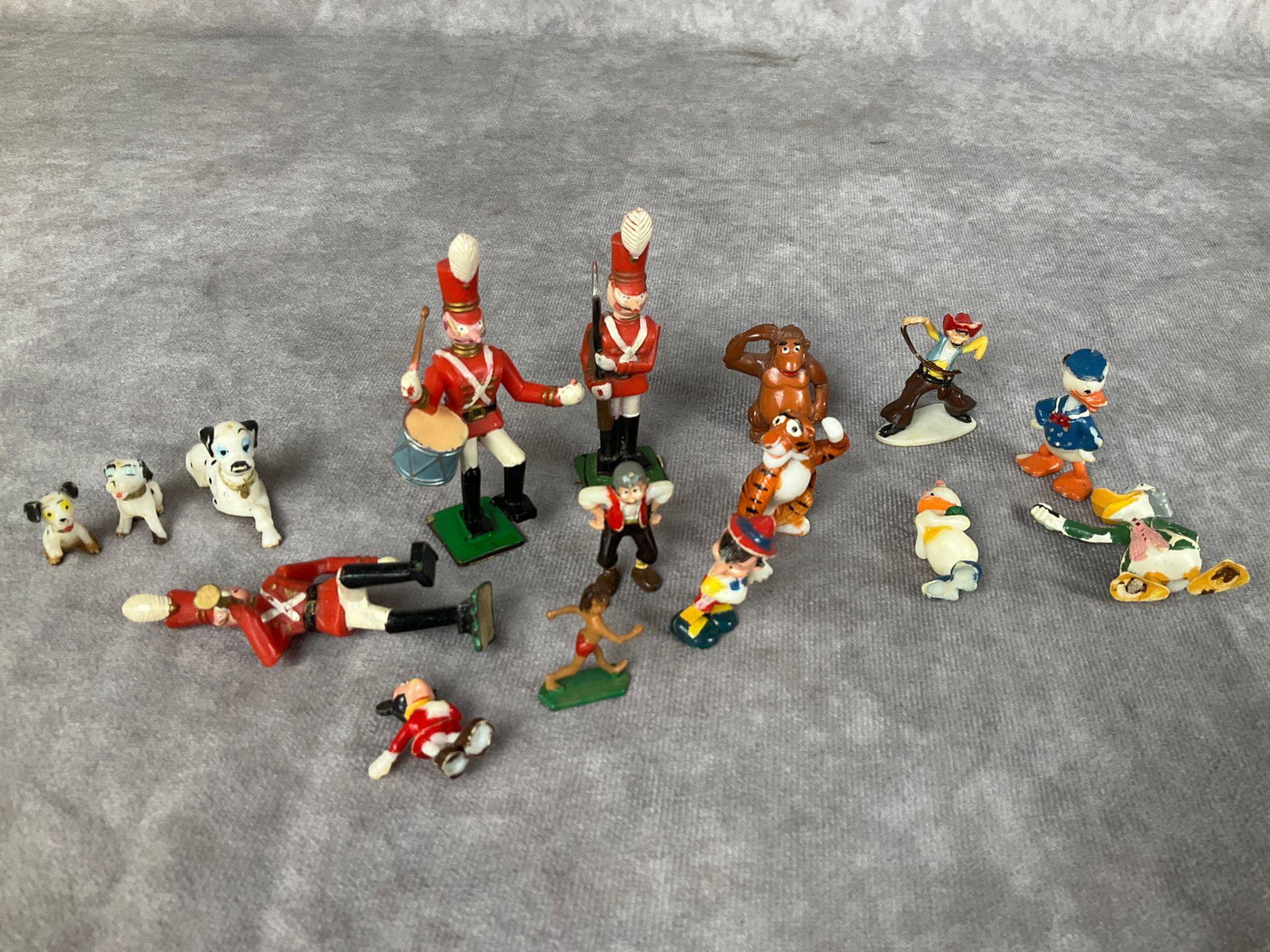 Disneykins Plastic Miniatures: Some marked for Hong Kong and Disney. Paint loss to all. Pecos Bill with missing hand. Soldier with drum has a broken drumstick. He is 3 inches tall.
