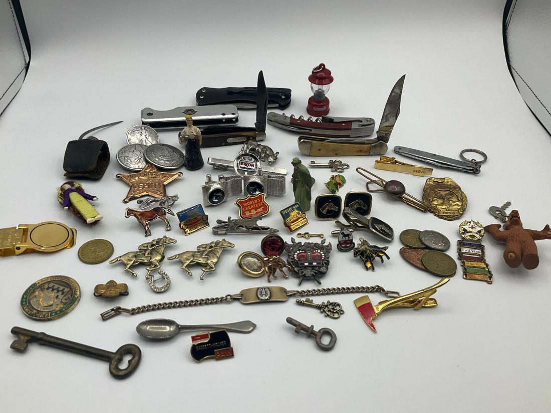 Pocket Knives, Cufflinks, and More: Assortment of items including keys, ALF keychain, Old Timer pocket knife, horse and jockey button covers, cock fighting spur, Exxon tie clip, etc. Fair to good with most items showing wear. Not all it