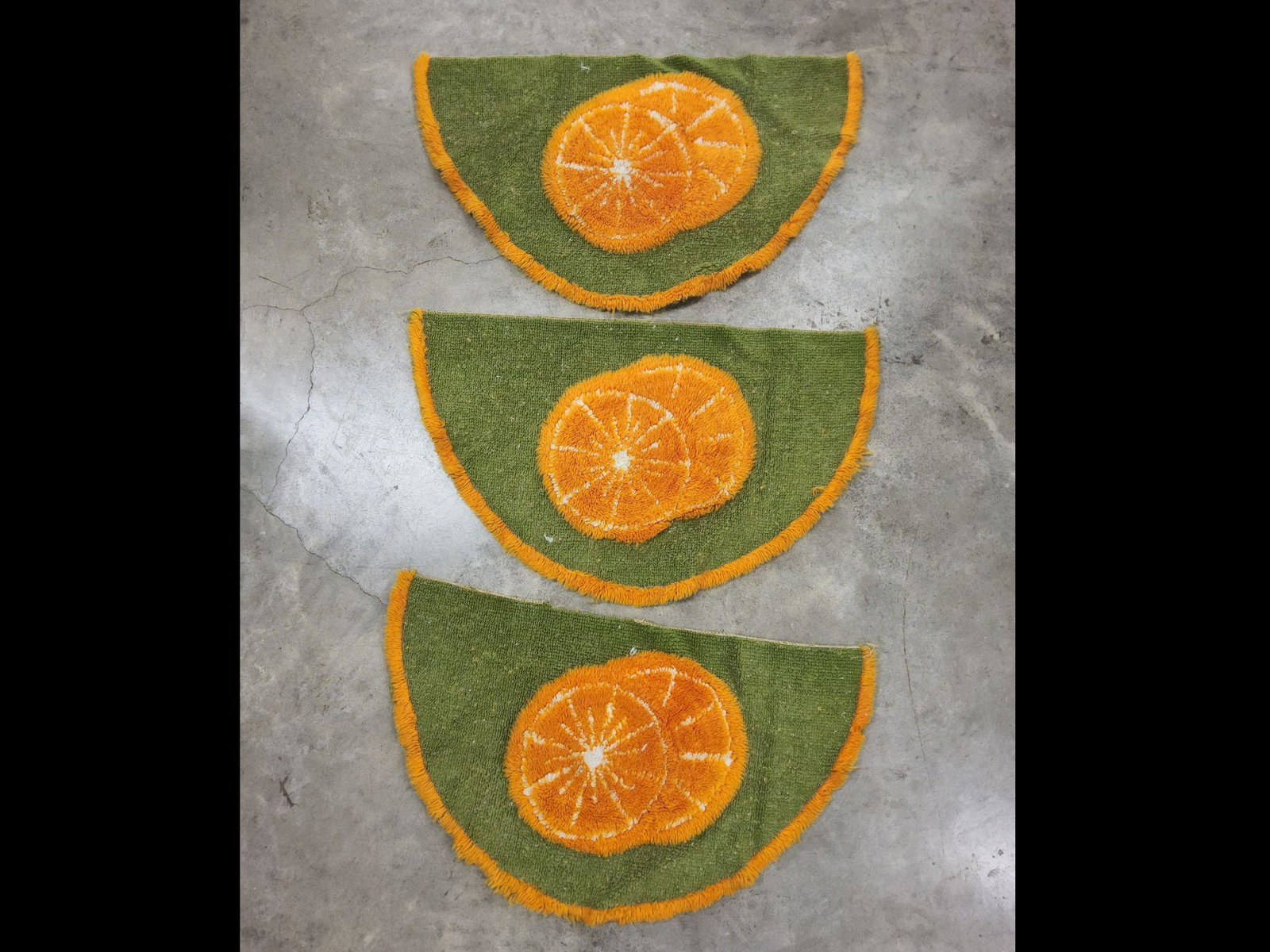 Three Vintage Retro Shag Orange Slice Half Moon Rugs: Wear from previous use. Measures approximately 30" x 18". Some soiling noted