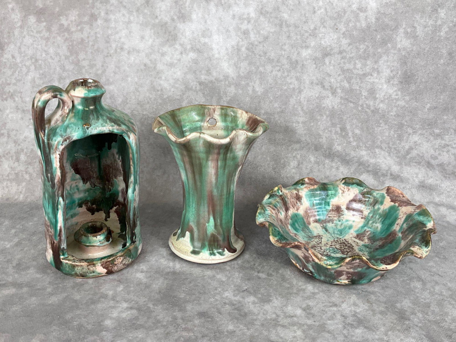 Virginia Redware Souvenir Pottery: Bowl is marked Skyline Drive, VA, candleholder jug is stamped Southern Hand-Made Pottery,, other unmarked. Crazing. Tallest is 7 inches.