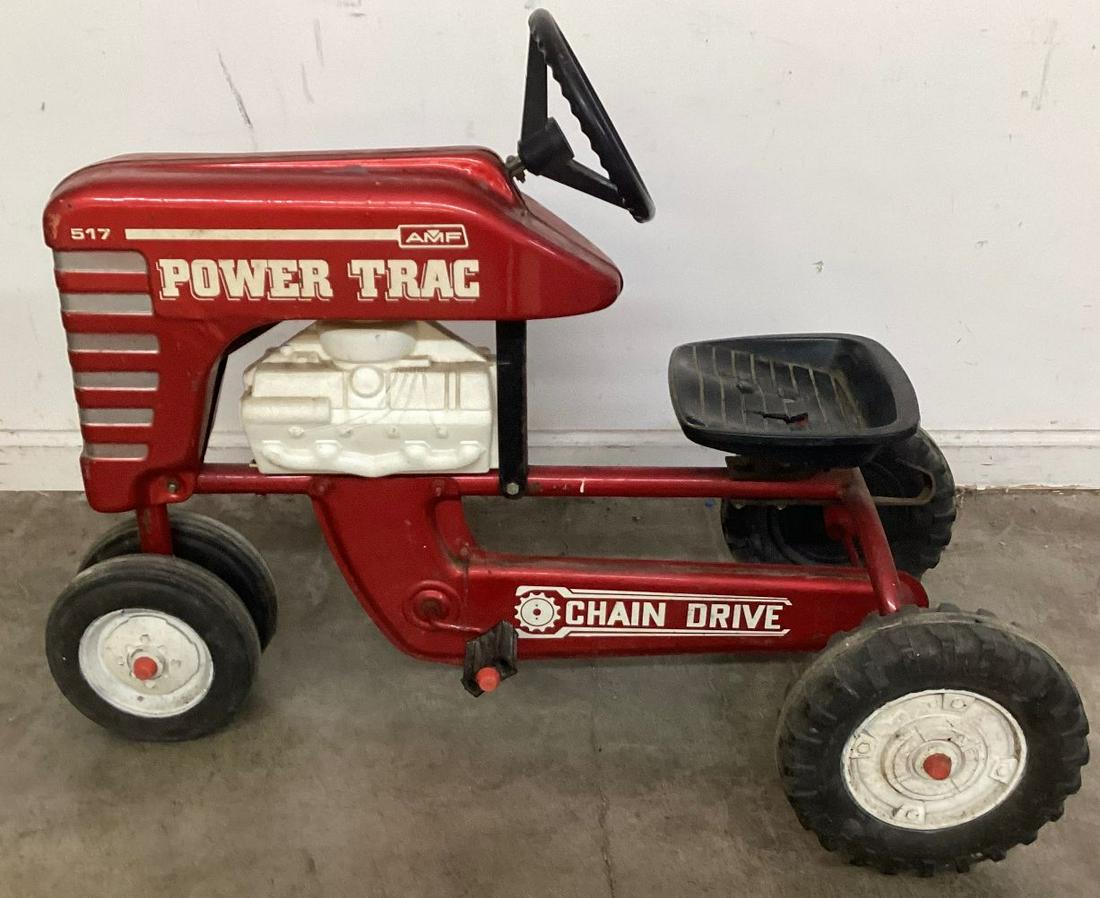 AMF Power Trac Pedal Tractor: Steering wheel is disconnected from the front wheels. Plastic seat is cracked. Wear to paint. 40" l x 19"d x 26" t