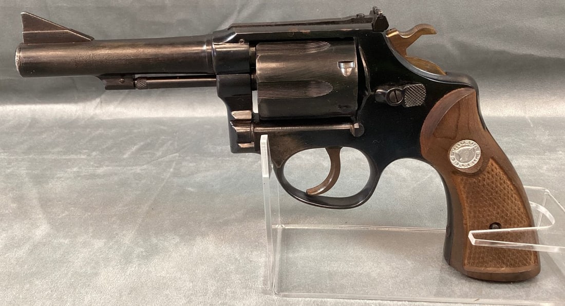 Taurus Model 80 Revolver in .38 Special: Serial# 716817. Approximately 70% finish with areas of thinning. Bore is very good with minor pitting. Grips are very good with minor wear. Barrel 4" Overall 9" Registration Required