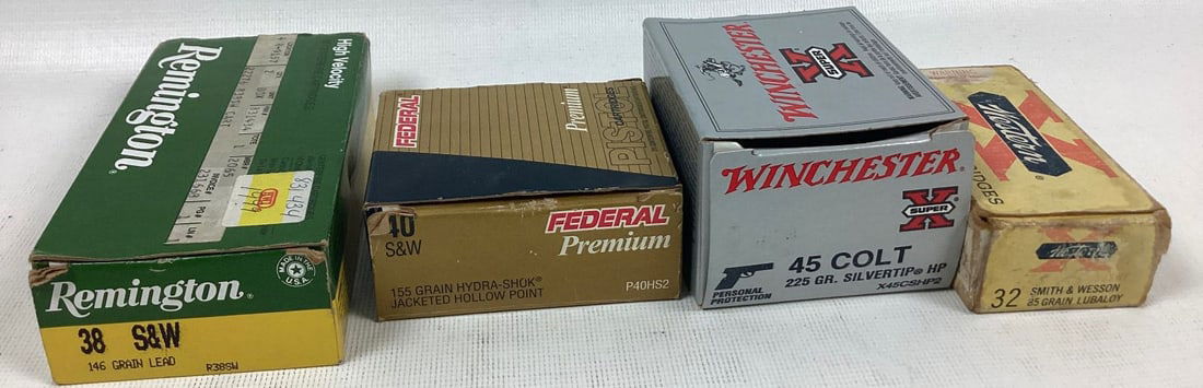 Lot of Miscellaneous Pistol Ammunition: 48 .38 Smith and Wesson, 15 40 Smith and Wesson, 14 45 Colt, approximately 25 32 Smith and Wesson. Boxes show wear.
