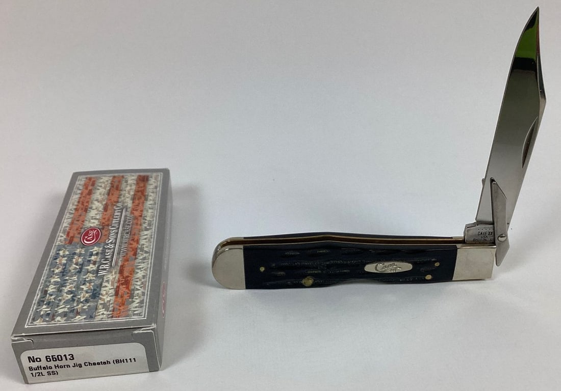 Case XX BH111 1/2 L Cheetah Pocketknife: Jigged buffalo horn handles. In original box. 4 1/4" long closed.
