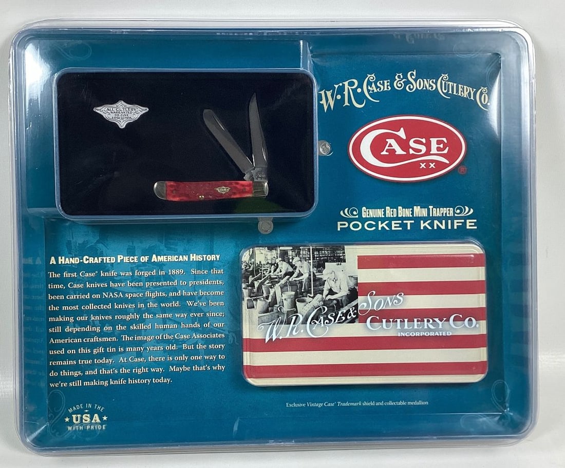 Case XX 6207SS Mini Trapper Pocketknife: Has red jigged bone handles. Sealed in original packaging. 3 1/2"long closed.